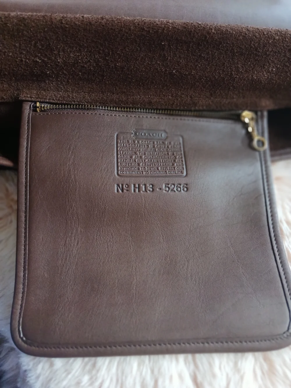 Classic Brown Leather Messenger Bag with Gold Hardware Coach.